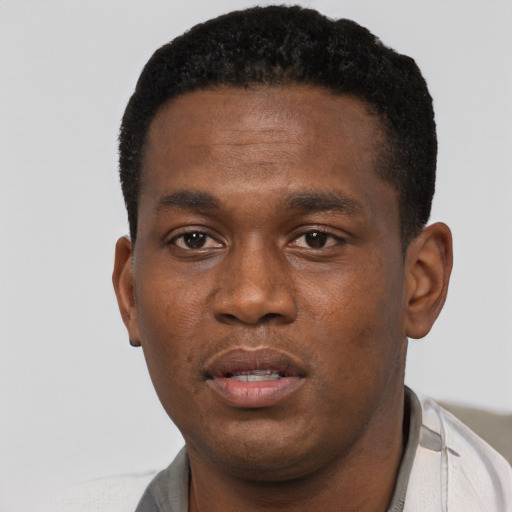 Neutral black young-adult male with short  black hair and brown eyes