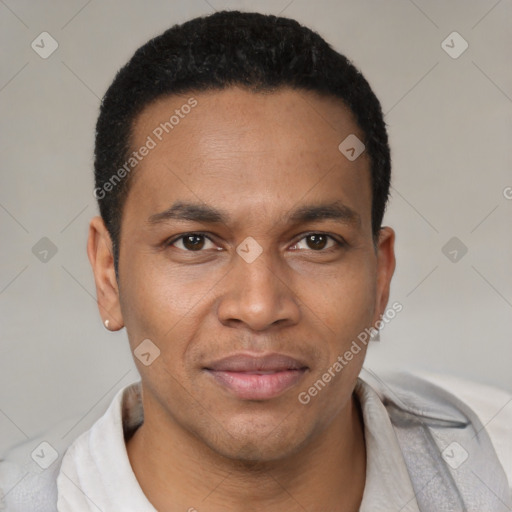 Joyful latino young-adult male with short  brown hair and brown eyes