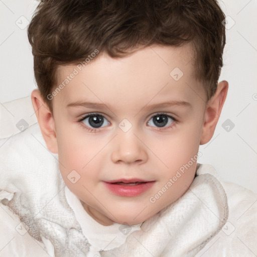 Joyful white child male with short  brown hair and brown eyes