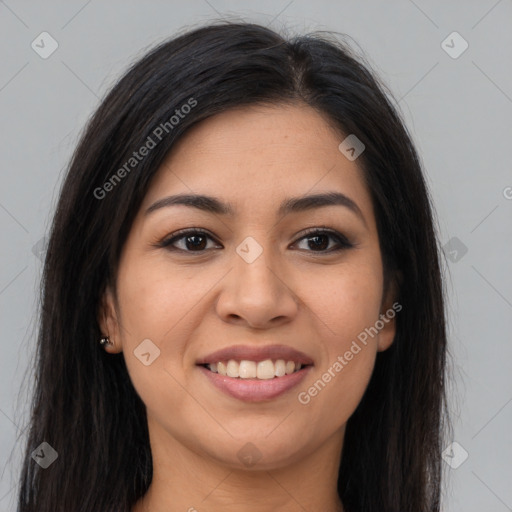 Joyful latino young-adult female with long  brown hair and brown eyes