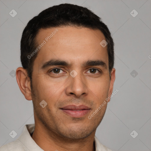 Joyful white young-adult male with short  black hair and brown eyes