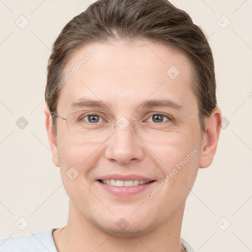 Joyful white young-adult female with short  brown hair and grey eyes