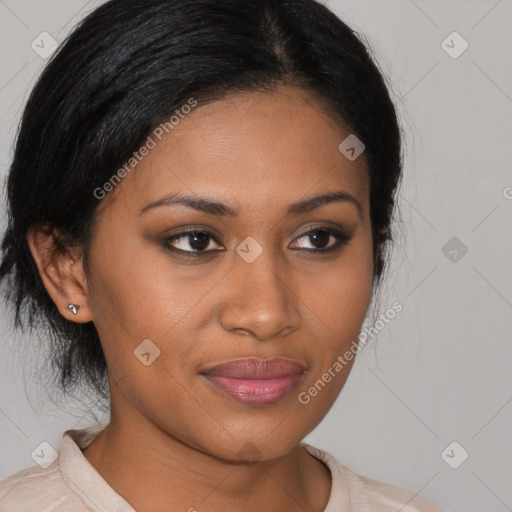 Joyful black young-adult female with medium  brown hair and brown eyes