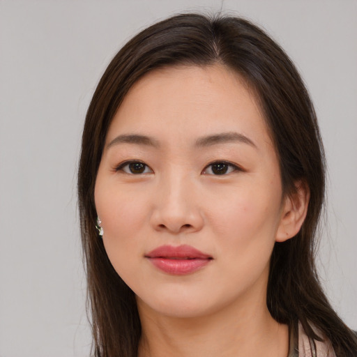 Neutral asian young-adult female with long  brown hair and brown eyes