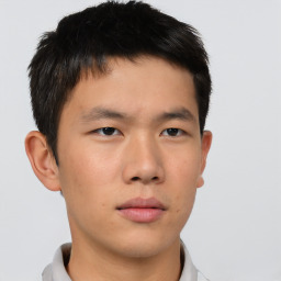 Neutral asian young-adult male with short  brown hair and brown eyes