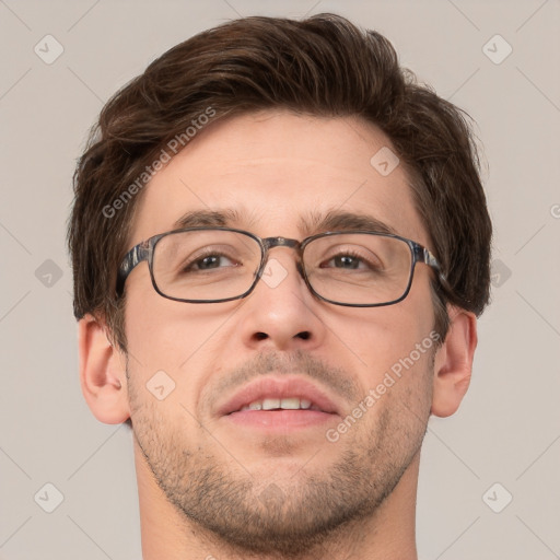 Joyful white adult male with short  brown hair and brown eyes