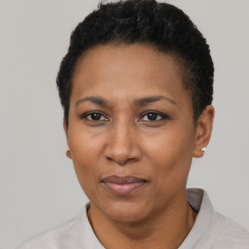 Neutral black adult female with short  black hair and brown eyes