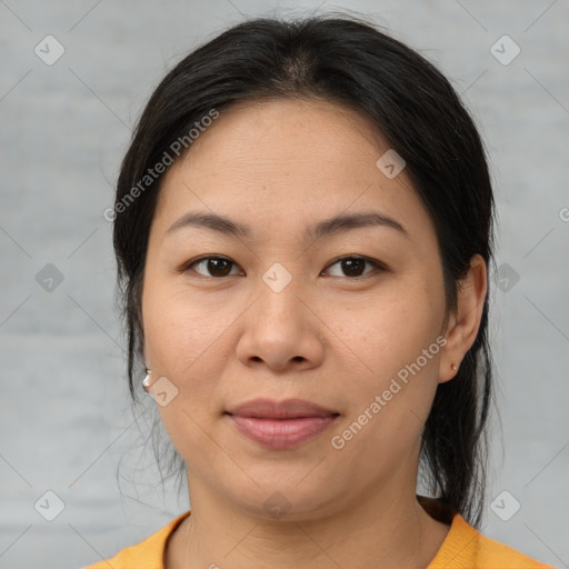 Joyful asian young-adult female with medium  brown hair and brown eyes