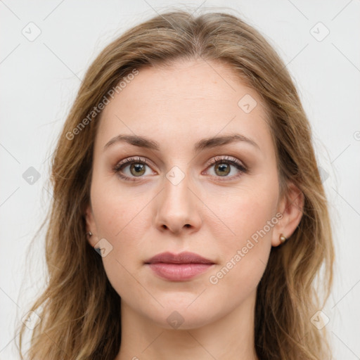 Joyful white young-adult female with long  brown hair and green eyes