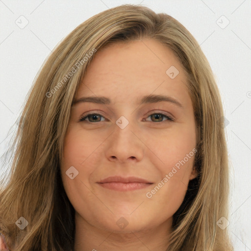 Joyful white young-adult female with long  brown hair and green eyes