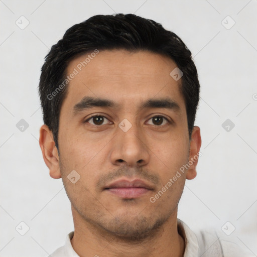 Neutral latino young-adult male with short  black hair and brown eyes