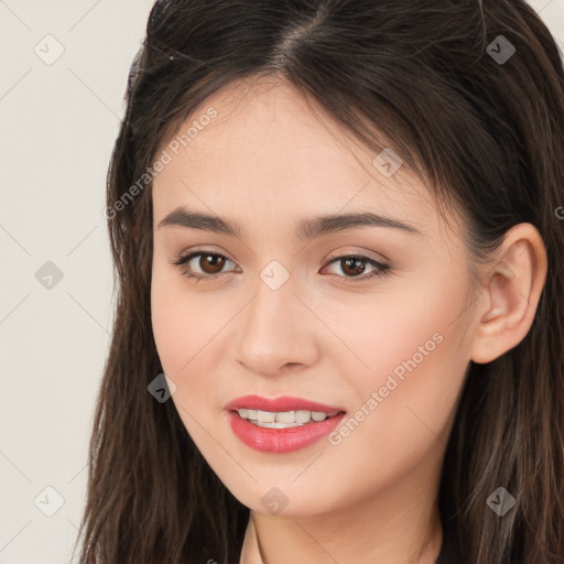 Joyful white young-adult female with long  brown hair and brown eyes