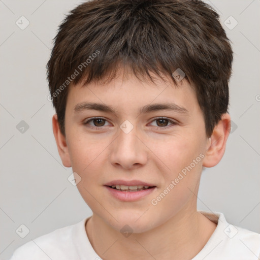 Joyful white child male with short  brown hair and brown eyes