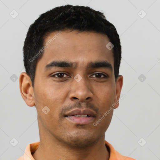 Neutral latino young-adult male with short  black hair and brown eyes
