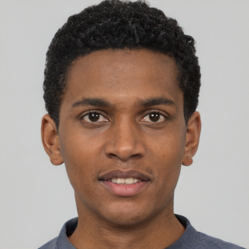 Neutral black young-adult male with short  black hair and brown eyes