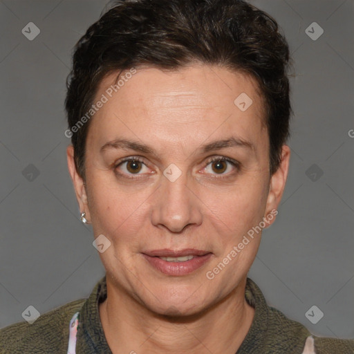 Joyful white adult female with short  brown hair and brown eyes