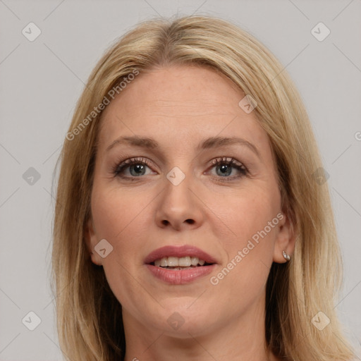 Joyful white adult female with long  brown hair and brown eyes