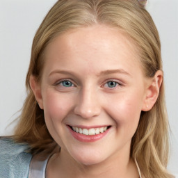 Joyful white young-adult female with medium  brown hair and blue eyes