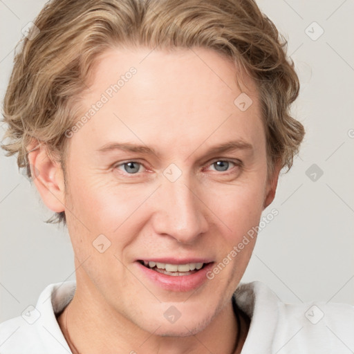 Joyful white young-adult female with short  brown hair and blue eyes