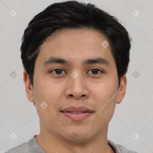 Joyful asian young-adult male with short  brown hair and brown eyes