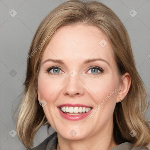 Joyful white young-adult female with medium  brown hair and blue eyes