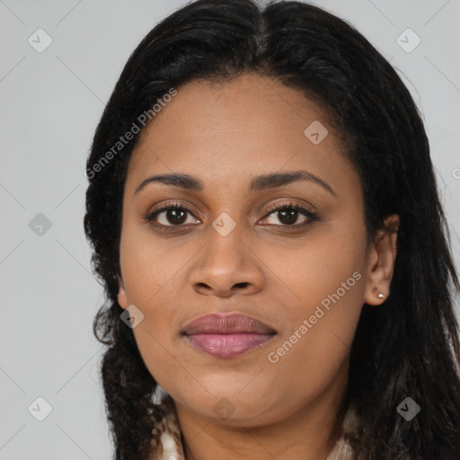 Joyful latino young-adult female with long  black hair and brown eyes