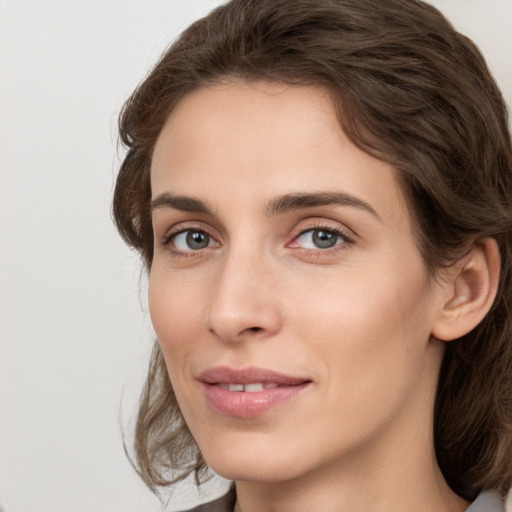 Neutral white young-adult female with medium  brown hair and grey eyes