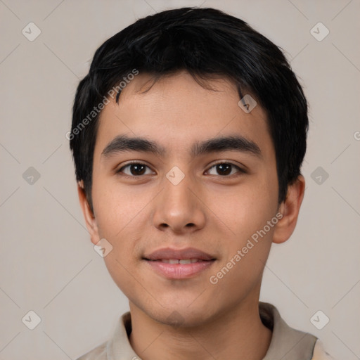 Joyful asian young-adult male with short  black hair and brown eyes