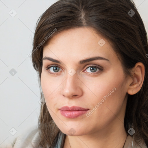 Neutral white young-adult female with long  brown hair and brown eyes