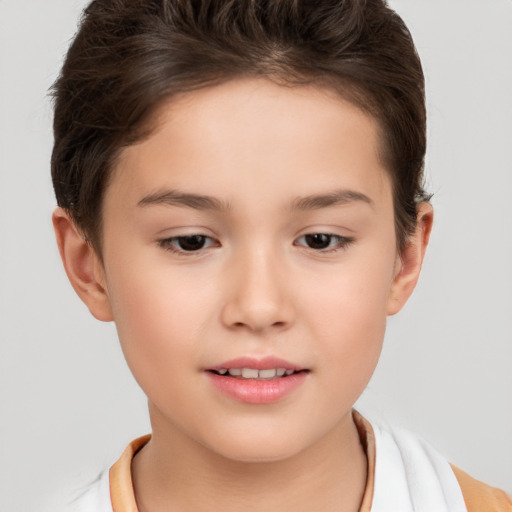 Joyful white child female with short  brown hair and brown eyes