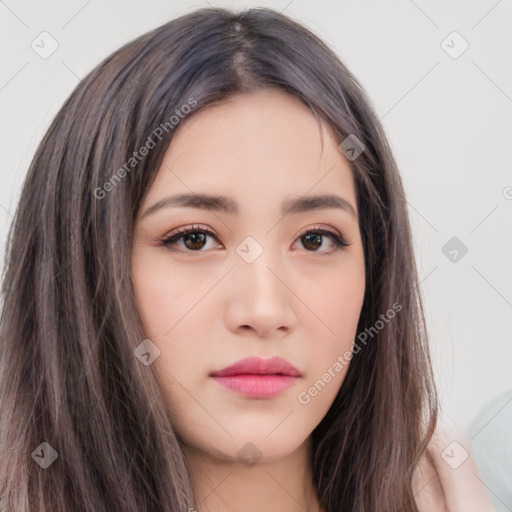 Neutral white young-adult female with long  brown hair and brown eyes