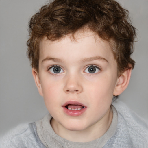 Neutral white child male with short  brown hair and blue eyes