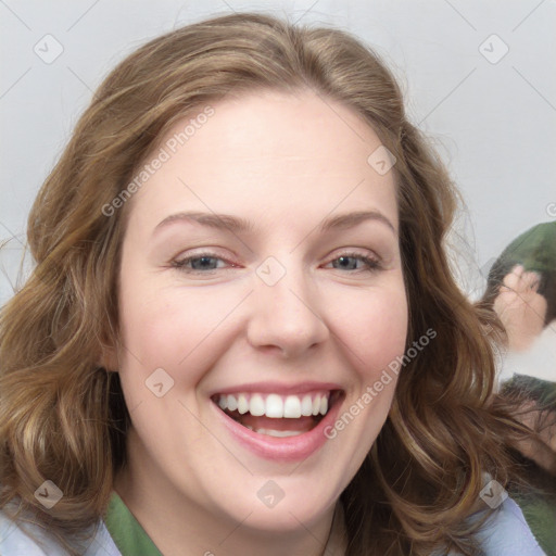 Joyful white young-adult female with medium  brown hair and green eyes