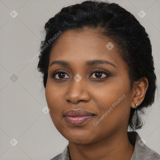 Joyful black young-adult female with medium  black hair and brown eyes