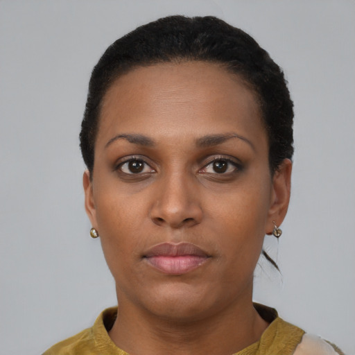 Neutral black young-adult female with short  brown hair and brown eyes