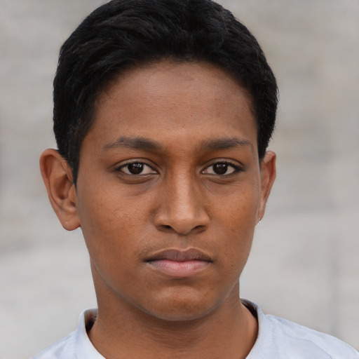 Neutral black young-adult male with short  brown hair and brown eyes