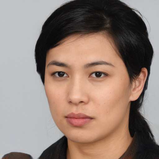 Neutral asian young-adult female with medium  black hair and brown eyes