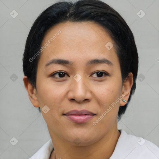 Joyful asian young-adult female with short  brown hair and brown eyes