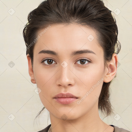 Neutral white young-adult female with medium  brown hair and brown eyes