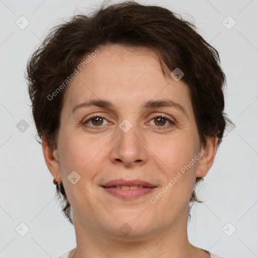 Joyful white adult female with short  brown hair and brown eyes