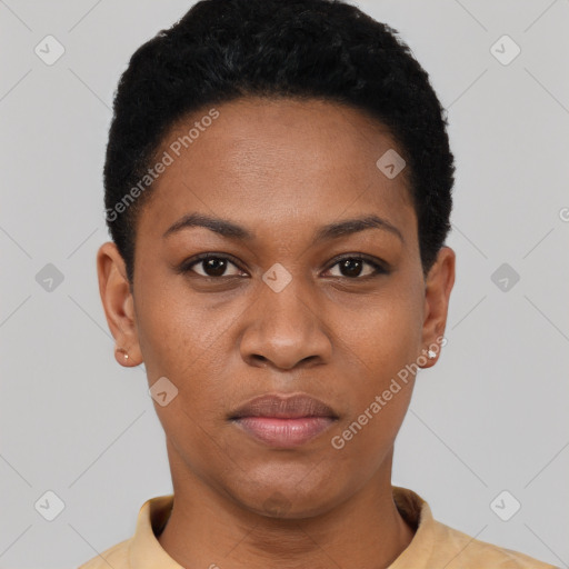 Joyful black young-adult female with short  black hair and brown eyes