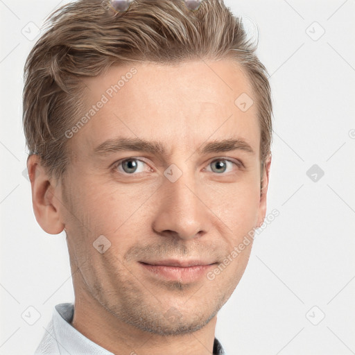 Joyful white adult male with short  brown hair and grey eyes