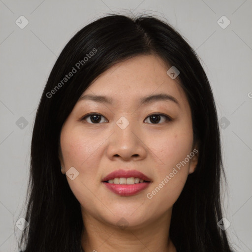 Joyful asian young-adult female with long  brown hair and brown eyes