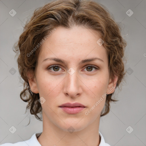 Joyful white young-adult female with medium  brown hair and green eyes