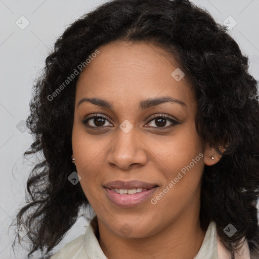 Joyful black young-adult female with medium  brown hair and brown eyes