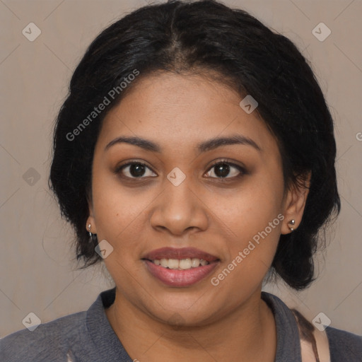 Joyful latino young-adult female with medium  black hair and brown eyes