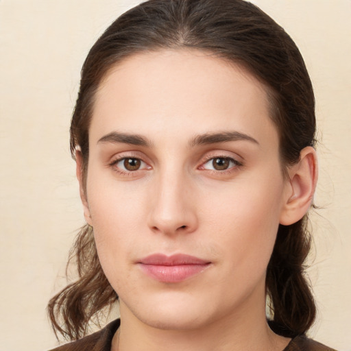 Neutral white young-adult female with medium  brown hair and brown eyes