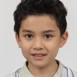 Joyful white child male with short  brown hair and brown eyes