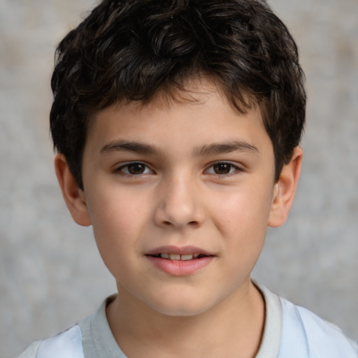 Joyful white child male with short  brown hair and brown eyes