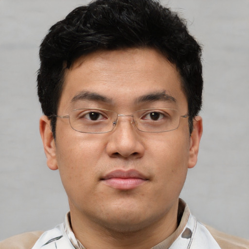 Neutral asian young-adult male with short  brown hair and brown eyes